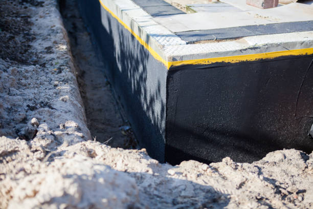 Professional Waterproofing technician working in Little River, SC